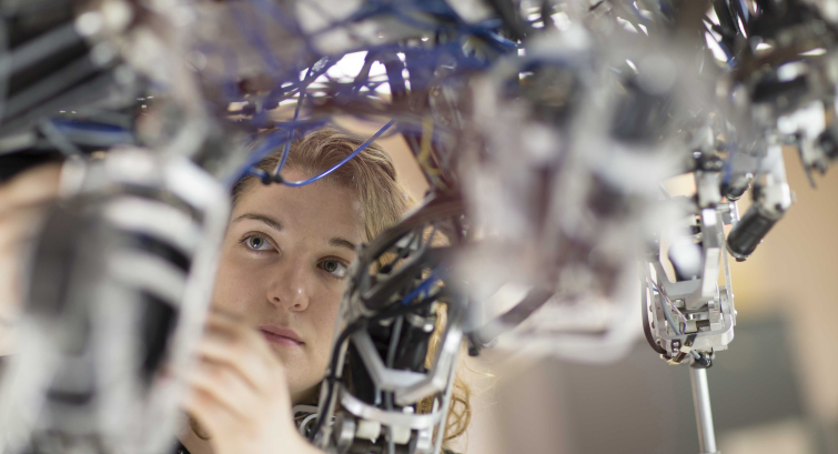 mechanical and aerospace engineering student working on a robot